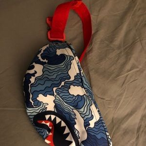 Fanny pack spray ground